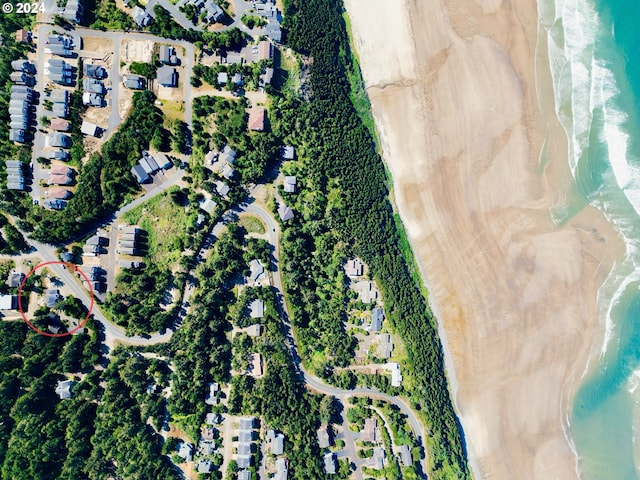 aerial view featuring a beach view and a water view
