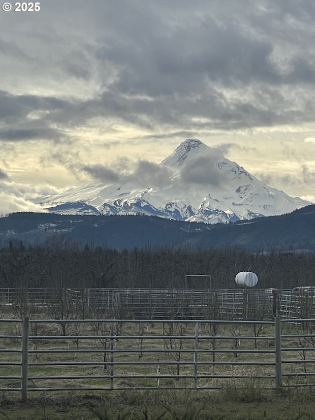 view of mountain feature featuring a rural view