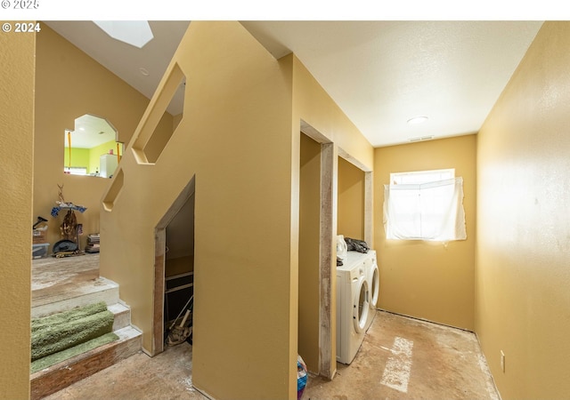 laundry room featuring laundry area and separate washer and dryer