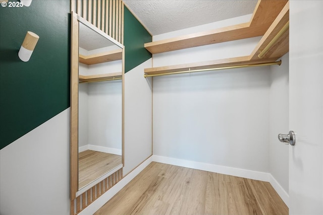 17221 SW Oakenshield Ct, Portland, OR 97224 - spacious closet with wood finished floors