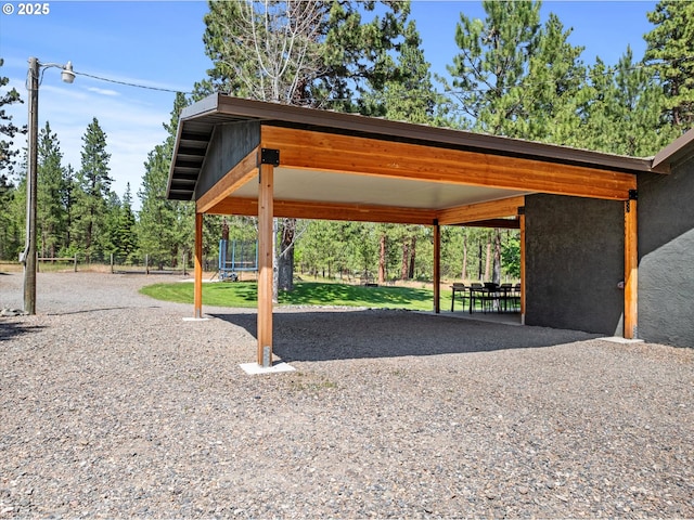 14955 Profitt Loop, Baker City, OR 97814 - view of vehicle parking with a carport and driveway