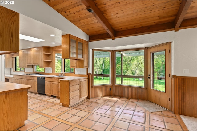 kitchen with open shelves, gas stovetop, a wealth of natural light, and light countertops
