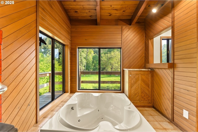 bathroom with a jetted tub, wood ceiling, wooden walls, and beamed ceiling