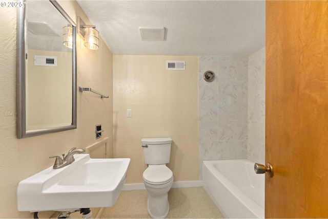 bathroom featuring toilet, baseboards, visible vents, and a sink
