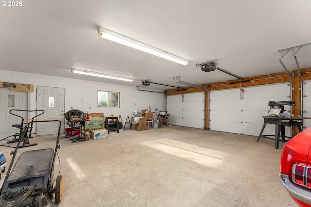 garage featuring a garage door opener
