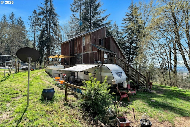 6596 River Rd, Salem, OR 97306 - view of home's exterior featuring a lawn and stairs