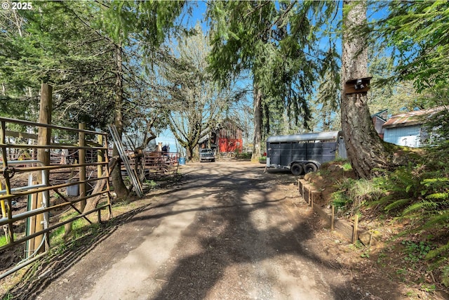 6596 River Rd, Salem, OR 97306 - view of road with dirt driveway and a gated entry