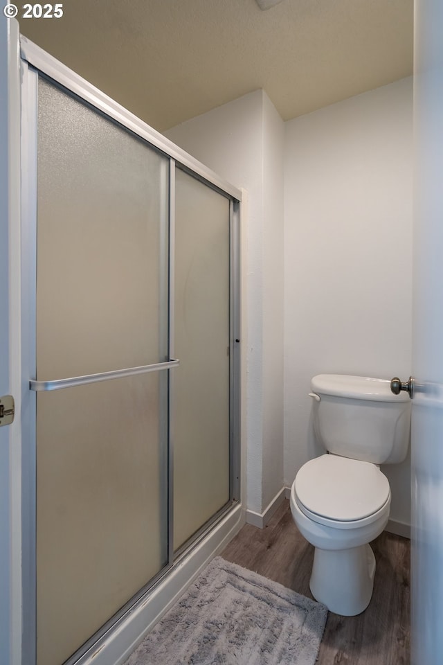2024 Lake Isle Dr Unit 2024, Eugene, OR 97401 - full bath with wood finished floors and an enclosed shower