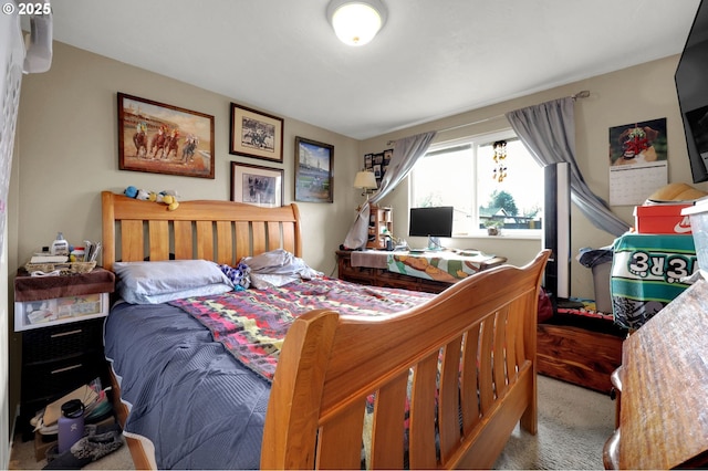 bedroom with light carpet