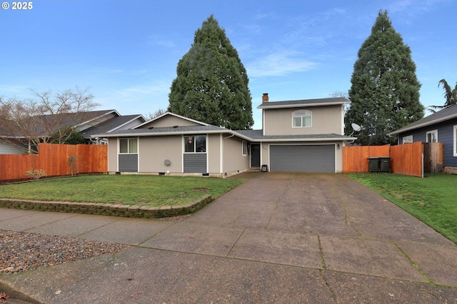 view of front of property with a front lawn and a garage