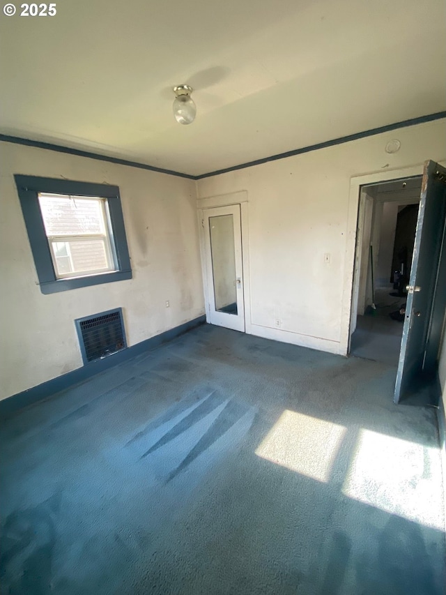 1412 5th St, Tillamook, OR 97141 - empty room with baseboards, heating unit, and carpet