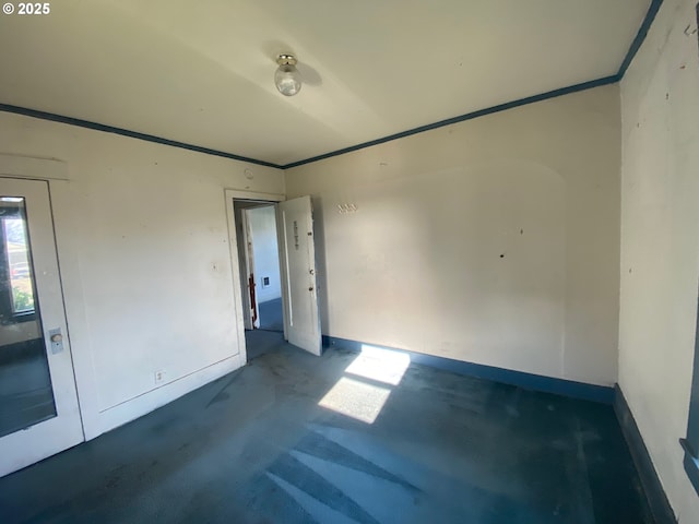 1412 5th St, Tillamook, OR 97141 - spare room featuring baseboards