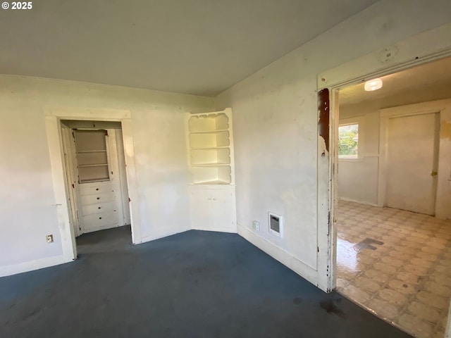 1412 5th St, Tillamook, OR 97141 - spare room featuring baseboards and visible vents