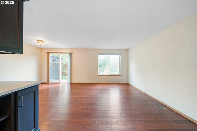 7501 NE 51st Way, Vancouver, WA 98662 - unfurnished living room with wood finished floors and baseboards