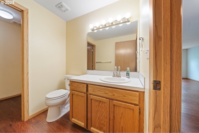 7501 NE 51st Way, Vancouver, WA 98662 - bathroom featuring wood finished floors, toilet, and vanity