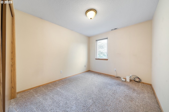 7501 NE 51st Way, Vancouver, WA 98662 - unfurnished room with carpet floors, baseboards, and a textured ceiling