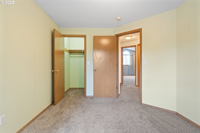 7501 NE 51st Way, Vancouver, WA 98662 - unfurnished bedroom featuring carpet flooring, baseboards, and a spacious closet