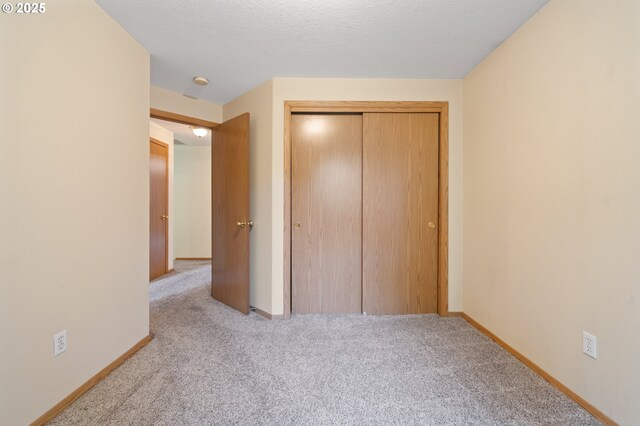 7501 NE 51st Way, Vancouver, WA 98662 - unfurnished bedroom with carpet flooring, a closet, and baseboards