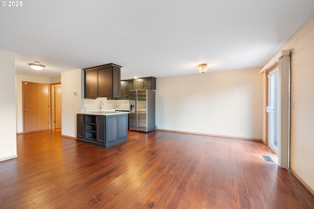 7501 NE 51st Way, Vancouver, WA 98662 - kitchen featuring stainless steel refrigerator with ice dispenser, dark wood-type flooring, light countertops, and a sink