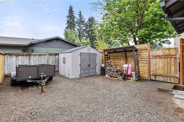 view of shed featuring a fenced backyard