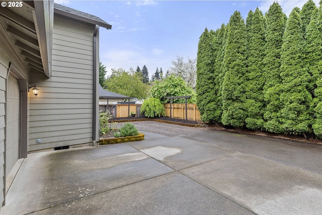 view of patio / terrace with fence
