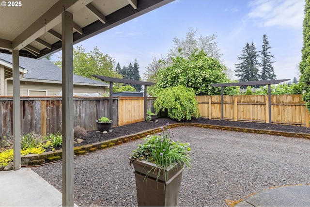view of yard featuring a fenced backyard and a patio