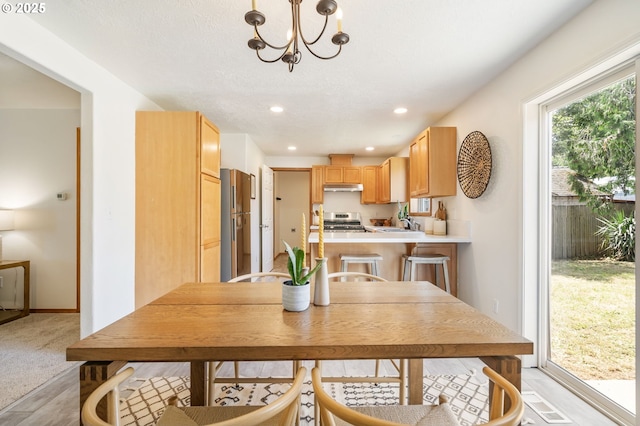 6837 SE 84th Ave, Portland, OR 97266 - dining room featuring a chandelier and recessed lighting