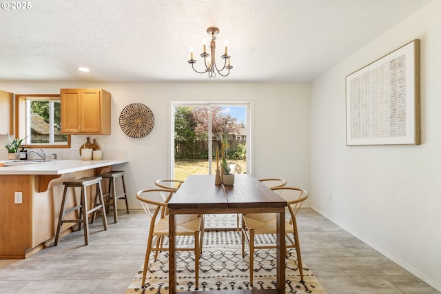 6837 SE 84th Ave, Portland, OR 97266 - dining space featuring plenty of natural light, a textured ceiling, a chandelier, and recessed lighting