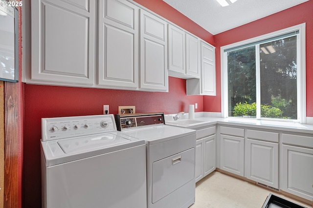 4710 SW Joshua St, Tualatin, OR 97062 - laundry area with cabinet space, separate washer and dryer, and healthy amount of natural light