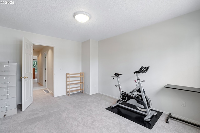 4710 SW Joshua St, Tualatin, OR 97062 - workout area featuring a textured ceiling and carpet floors