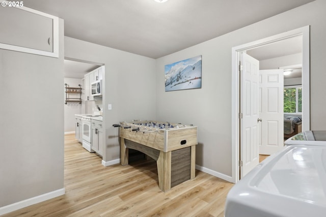 23595 E Lolo Pass Rd, Rhododendron, OR 97049 - playroom with light wood-type flooring and baseboards