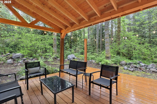 23595 E Lolo Pass Rd, Rhododendron, OR 97049 - wooden terrace featuring a forest view and an outdoor living space