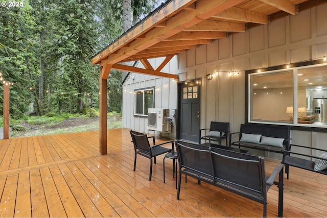 23595 E Lolo Pass Rd, Rhododendron, OR 97049 - wooden deck with an outdoor living space and a cooling unit