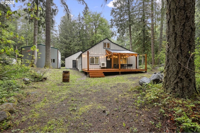 23595 E Lolo Pass Rd, Rhododendron, OR 97049 - back of house with a deck and board and batten siding
