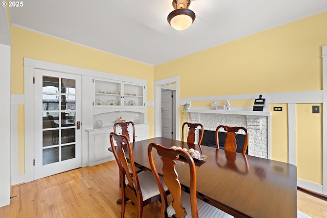 dining space featuring light wood-style floors