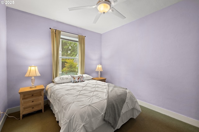 bedroom featuring carpet flooring, baseboards, and a ceiling fan