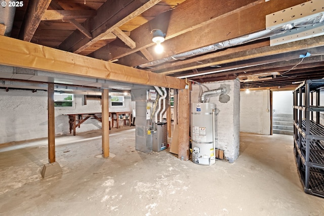 below grade area featuring strapped water heater and heating unit