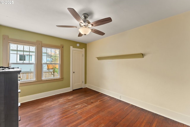339 W Laurelwood Ct, Roseburg, OR 97470 - spare room with baseboards, dark wood finished floors, and ceiling fan