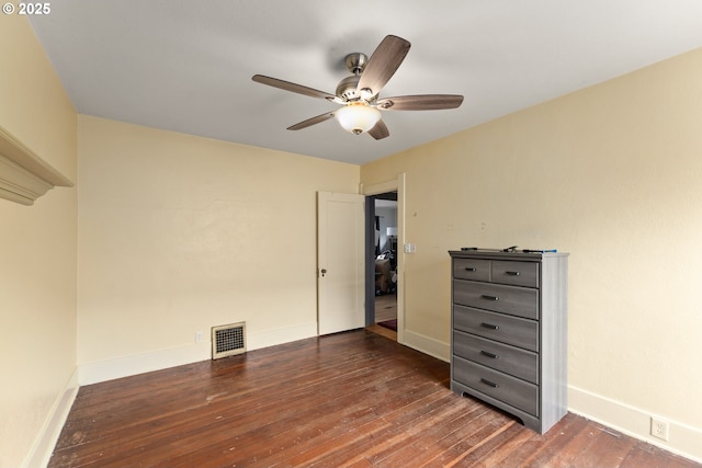 339 W Laurelwood Ct, Roseburg, OR 97470 - unfurnished bedroom with hardwood / wood-style floors, baseboards, and a ceiling fan