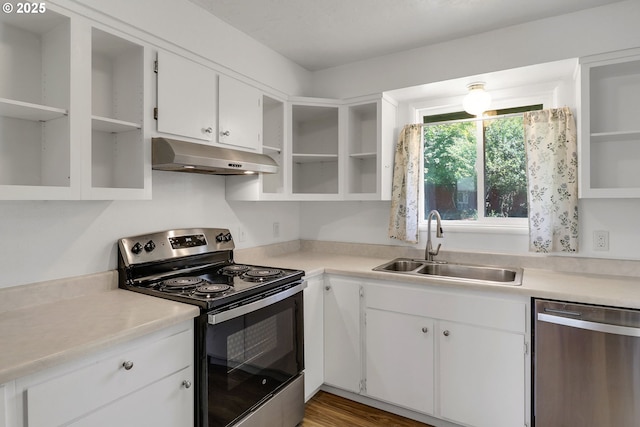 1437 Sequoia Ave, Springfield, OR 97477 - kitchen with open shelves, stainless steel appliances, extractor fan, and a sink