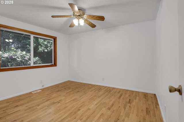 1437 Sequoia Ave, Springfield, OR 97477 - spare room featuring light wood-style flooring, baseboards, and a ceiling fan