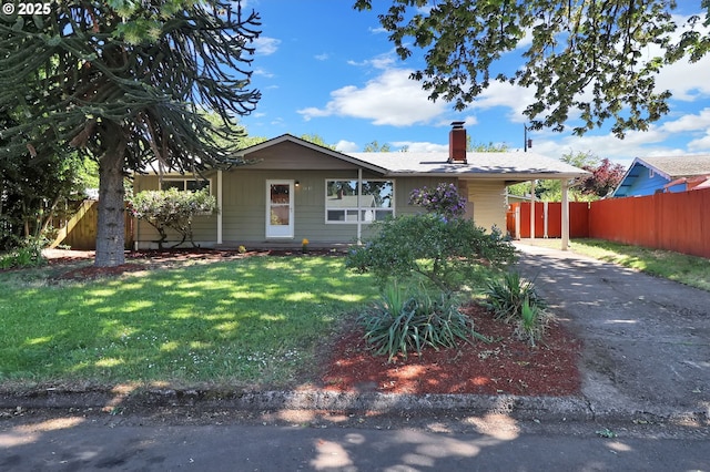 1437 Sequoia Ave, Springfield, OR 97477 - view of front of home featuring a chimney, concrete driveway, and an attached carport