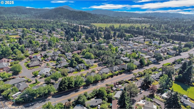 1437 Sequoia Ave, Springfield, OR 97477 - aerial view of property's location with mountains, nearby suburban area, and a forest