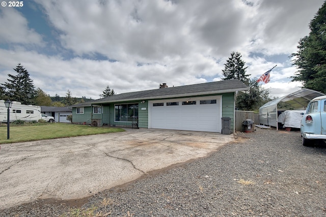 92700 Holly Ln, Astoria, OR 97103 - view of front of property featuring a front lawn, driveway, an attached garage, and a chimney
