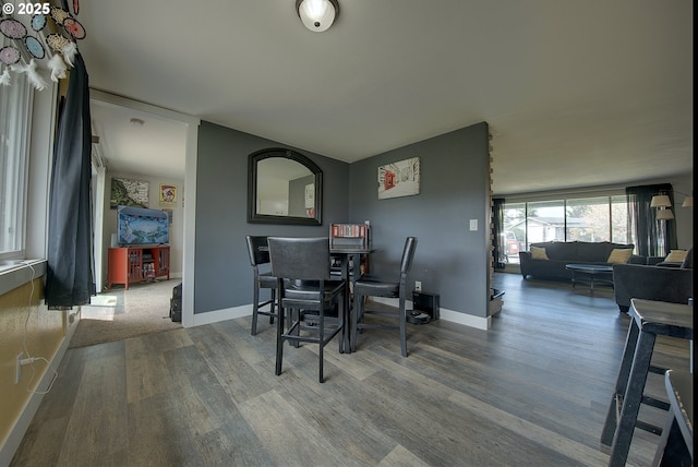 92700 Holly Ln, Astoria, OR 97103 - dining room featuring wood finished floors and baseboards