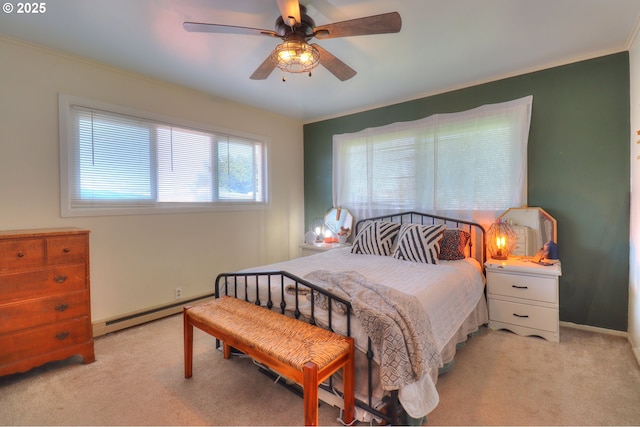 94178 9th St, Gold Beach, OR 97444 - bedroom featuring light colored carpet, a baseboard heating unit, crown molding, ceiling fan, and baseboards
