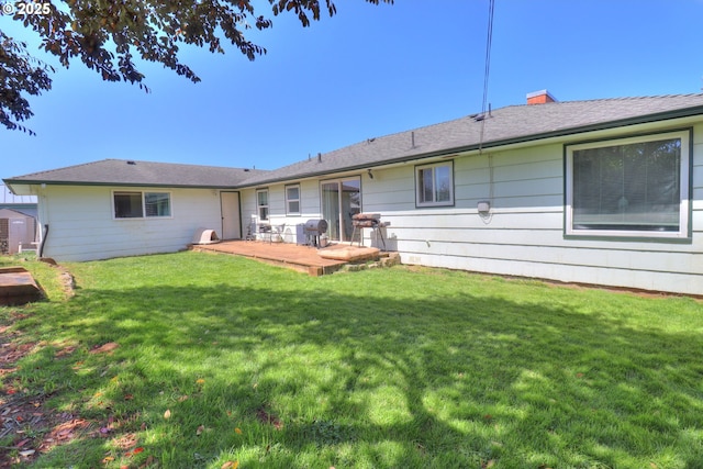 94178 9th St, Gold Beach, OR 97444 - rear view of house with a wooden deck, a yard, and a chimney