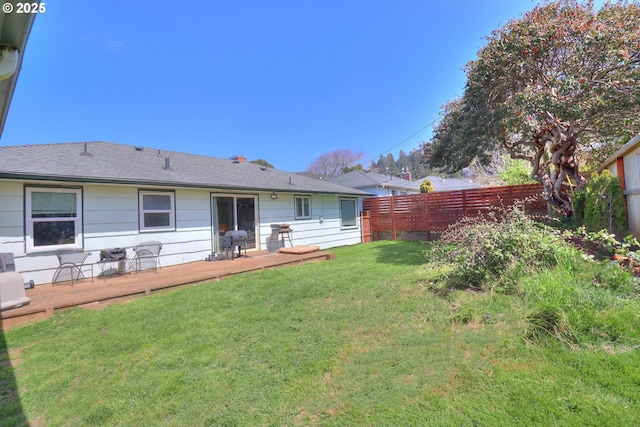 94178 9th St, Gold Beach, OR 97444 - back of house featuring a fenced backyard, a deck, and roof with shingles