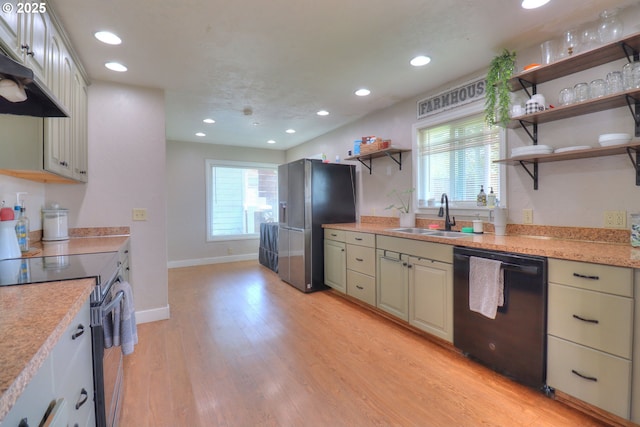 94178 9th St, Gold Beach, OR 97444 - kitchen with stainless steel appliances, open shelves, light wood finished floors, under cabinet range hood, and recessed lighting