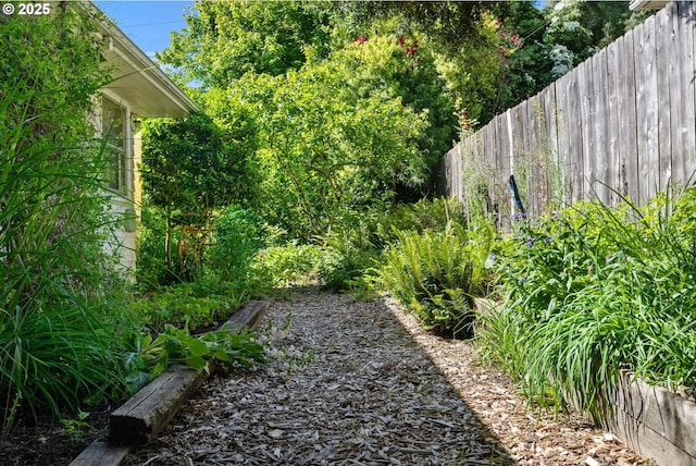 view of yard with fence